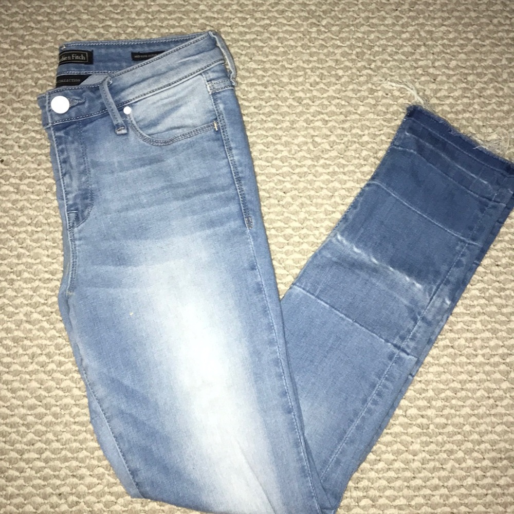 Mid-rise light wash skinny jeans